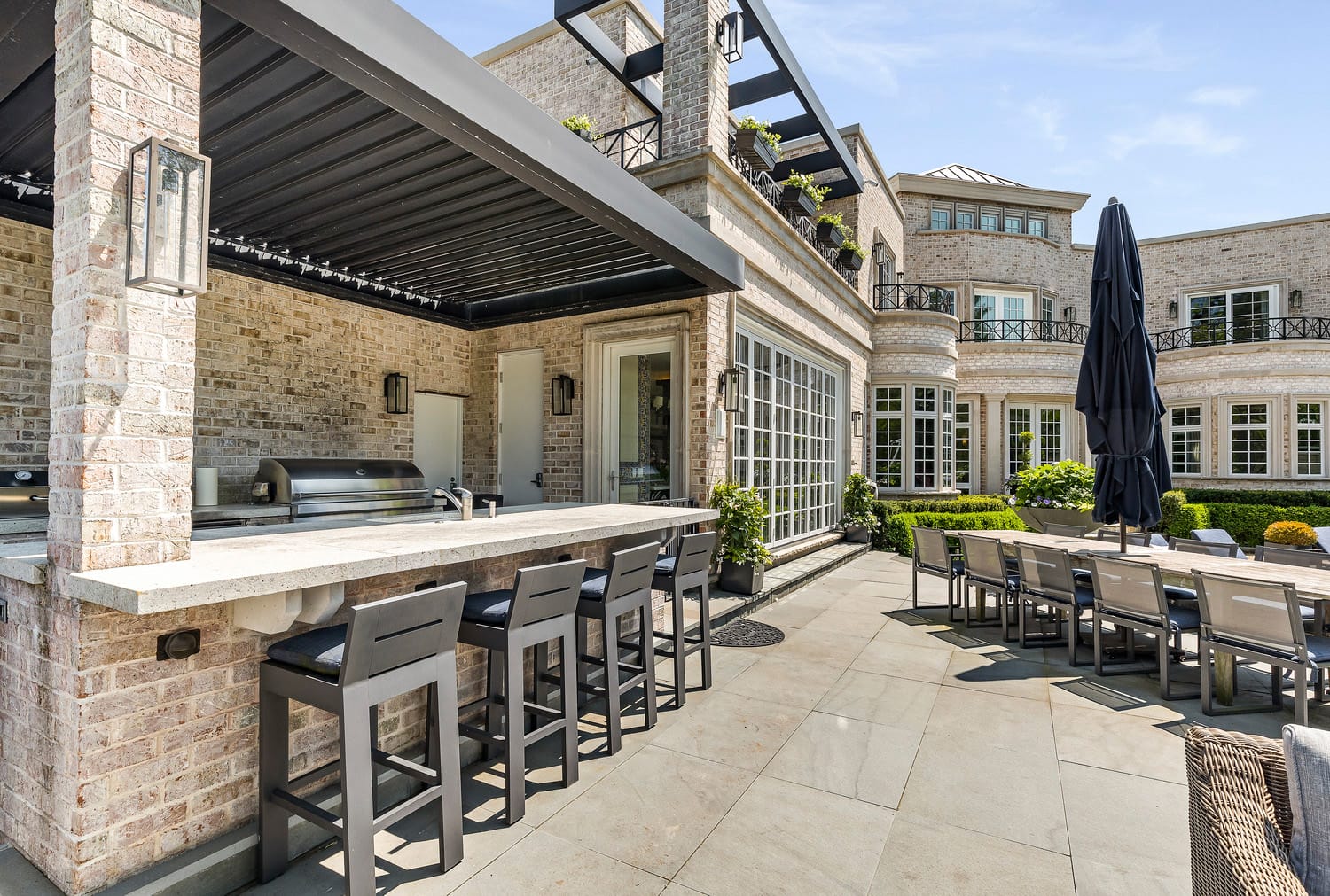 Image of the backyard of a transitional signature estate home built by Michael Bennett Homes®